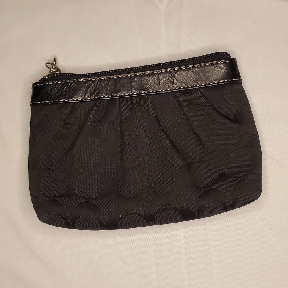 Coach black signature canvas and leather wristlet